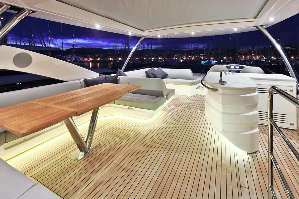 Explore the Lounge Area located on the Flybridge of the ship.